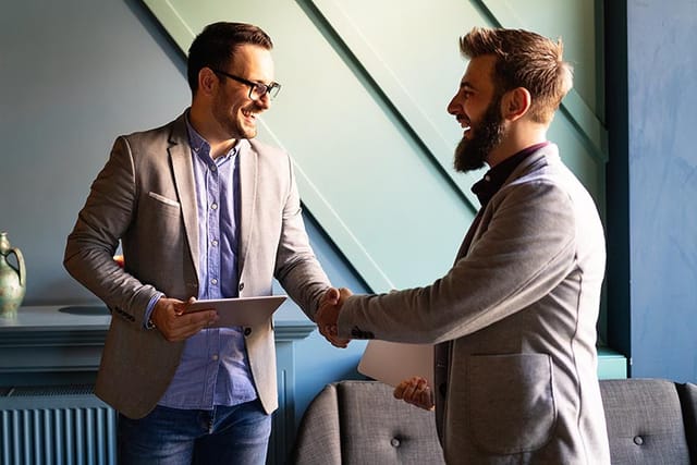 Business handshake and business people concept. Partnership, deal, agreement.